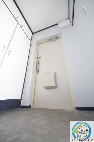 明石市大久保町高丘７丁目の中古マンションの玄関