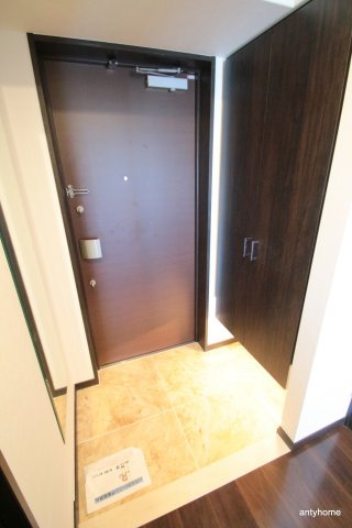 プレジオ江坂2　仲介手数料無料の玄関