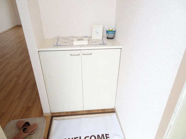 フラッツ内原の玄関