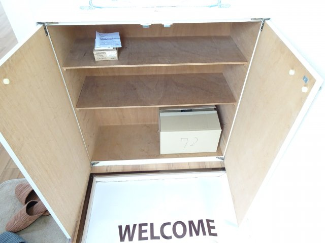 フラッツ内原の玄関