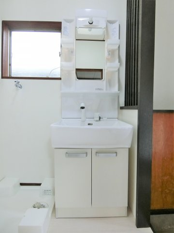 土気町戸建の洗面所