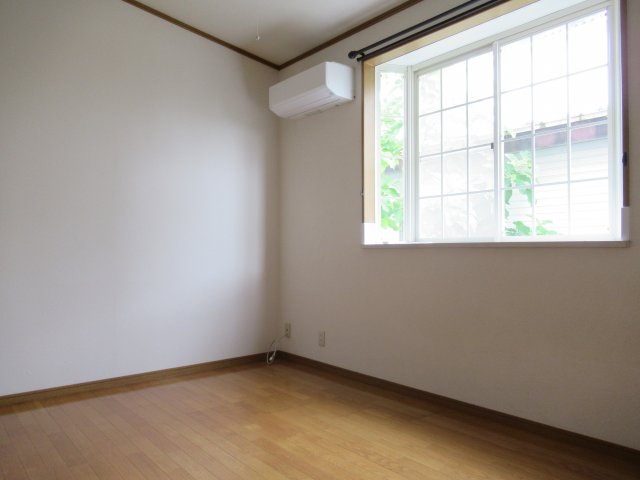 ヴィレッジマツナミ２１の洋室