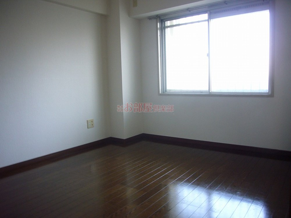 レジデンス高屋敷の寝室|落ち着いた色調の寝室です