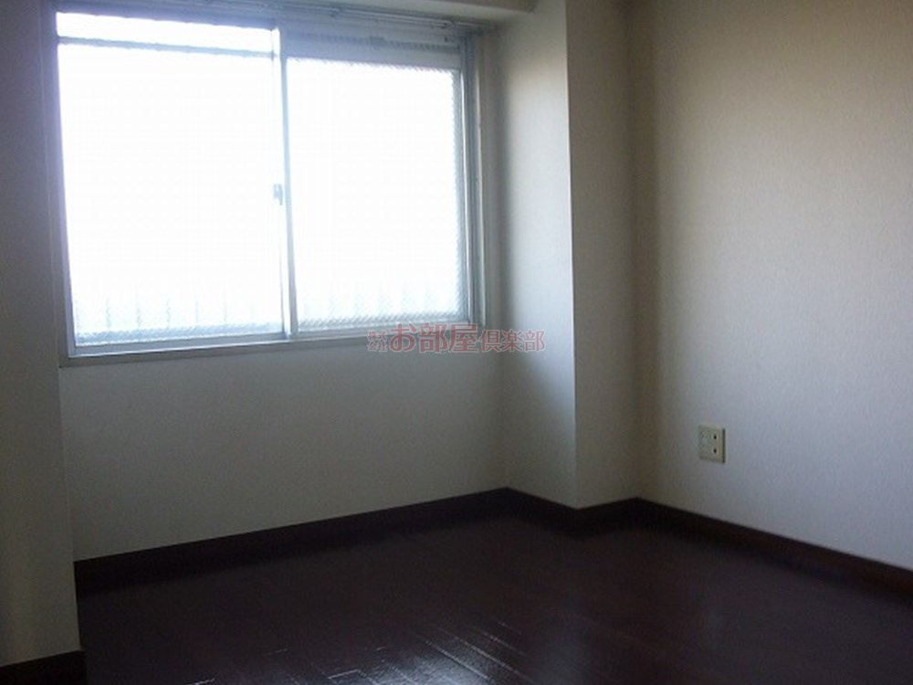 レジデンス高屋敷の洋室|落ち着いた色調の洋室です