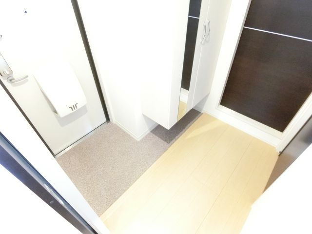 サウスメゾンジャスミンの玄関|同物件別部屋