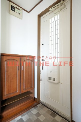 フリーデン安居野G棟【キャッシュバック対象物件】の玄関|落ち着いた玄関です