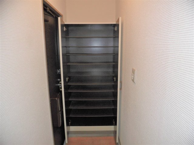 アネックス華ブラウンの玄関