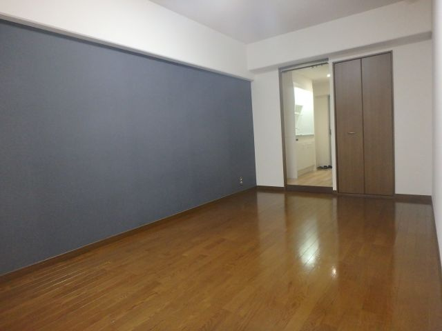 メゾン・ドーム千成の洋室