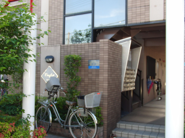 大阪市淀川区加島１丁目の賃貸マンションのエントランス