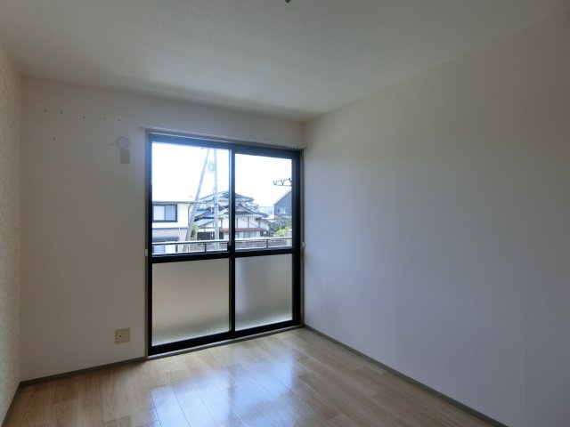 ヴィラ西福原A棟の洋室