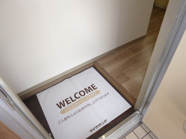 プレジール千田の玄関