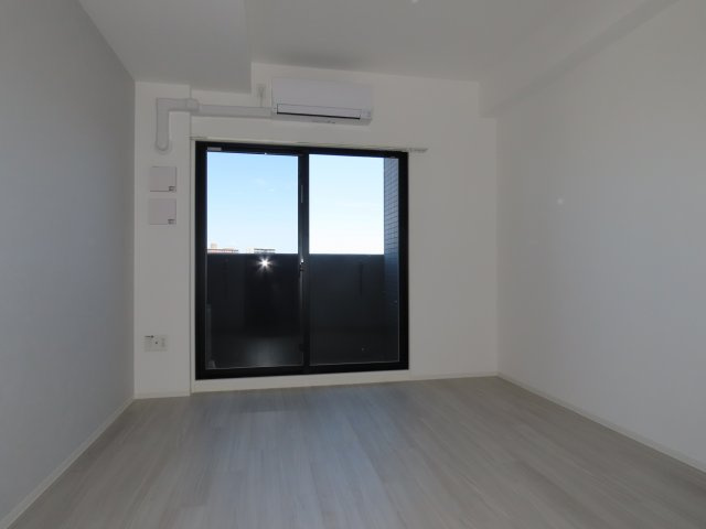 レジュールアッシュ塚本レジデンスの洋室