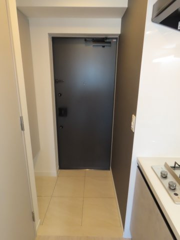 レジュールアッシュ塚本レジデンスの玄関