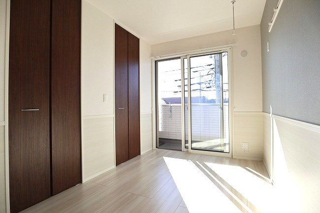 ロイジェント加美平の寝室