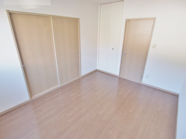 コートピア堀田の寝室