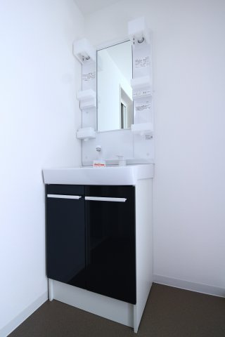 ジーメゾン塩屋の洗面所