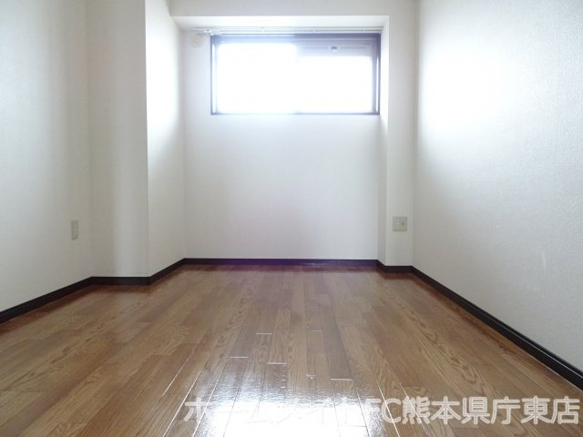 熊本市西区横手４丁目の賃貸マンションの寝室