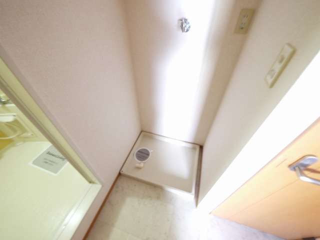 ロイヤルKの設備|室内洗濯置き場