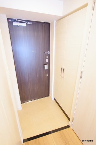 ディームス江坂　仲介手数料無料の玄関