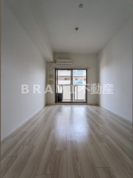 エスリード谷町四丁目 BRAVI不動産の洋室