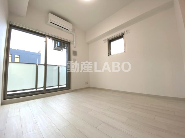 エステムコート難波WEST-SIDEⅥグラッドの居間・リビング