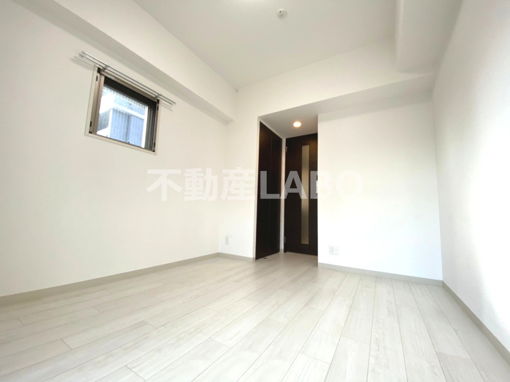 エステムコート難波WEST-SIDEⅥグラッドの寝室