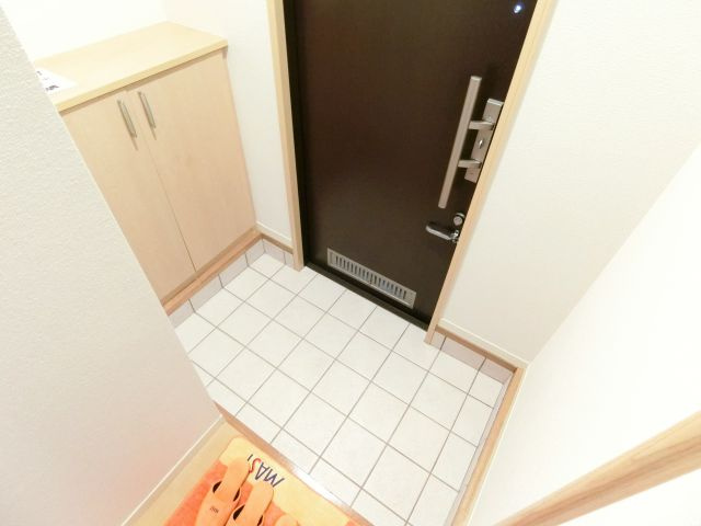 シャーメゾン泉ヶ丘の玄関