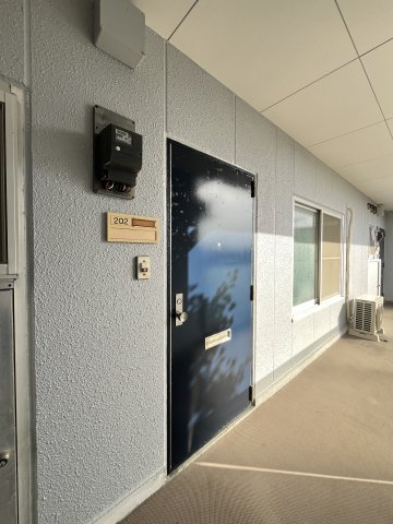 富谷マンションの玄関