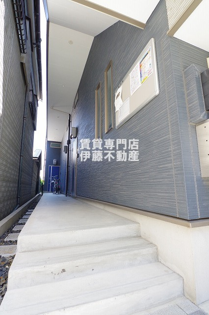 Ampio庄内伍番館のエントランス