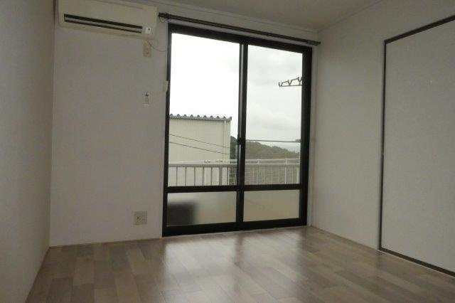 プレジール佐藤Aの居間・リビング|洋室