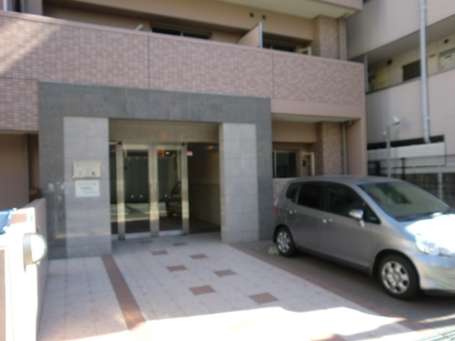 大阪市淀川区十三東１丁目の賃貸マンションのエントランス