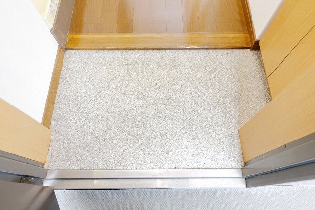 阿部松島マンションの玄関