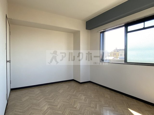 ハイグレード堅下の洋室