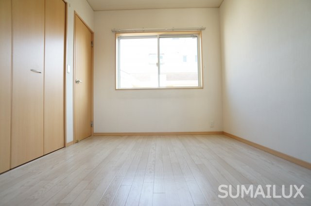 熊本市西区田崎１丁目のアパートの寝室