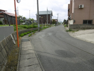 【前面道路含む現地写真】 | 黒石市北美町土地A | 前面道路含む現地写真です