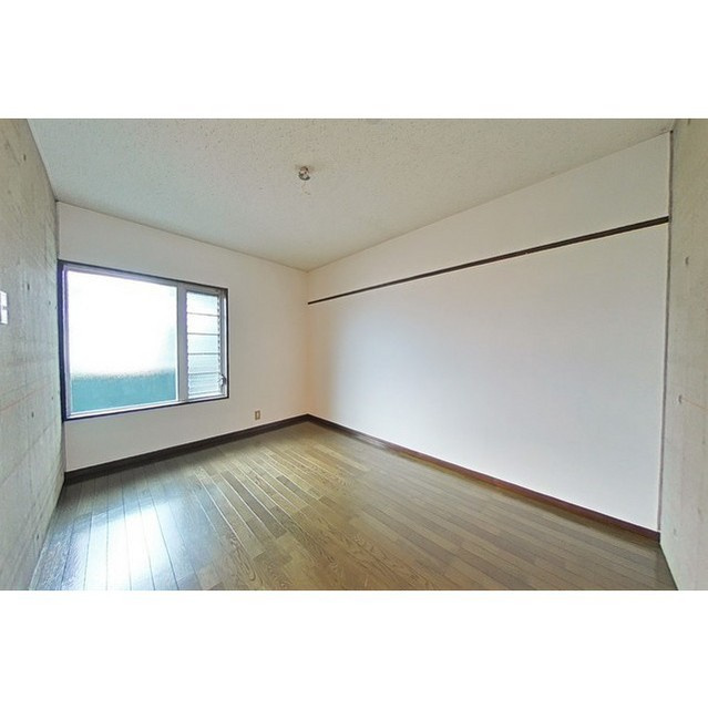 コーポＦＵＫＵＳＩＭＡの居間・リビング