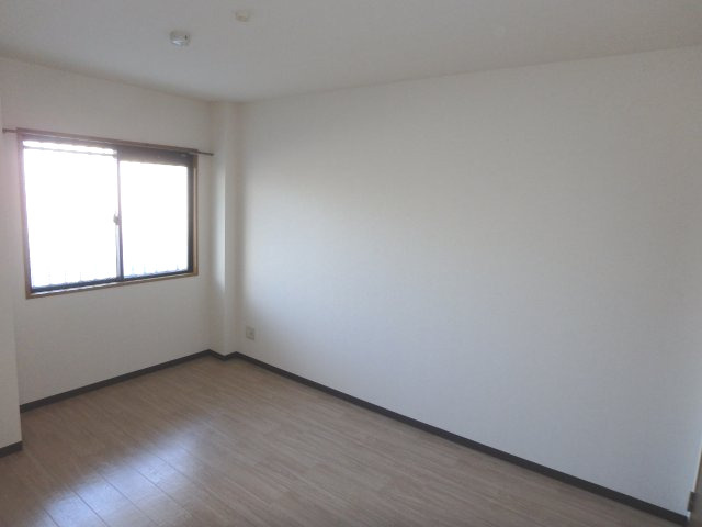 ビューリバー豊成の洋室