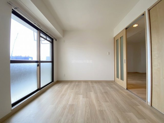 広島市西区庚午中４丁目の賃貸マンションの寝室