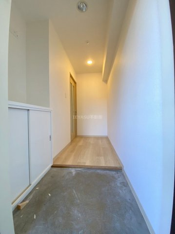 広島市西区庚午中４丁目の賃貸マンションの玄関