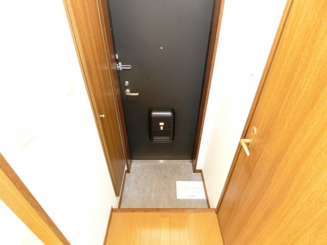 アンプルールクラージュCUREの玄関