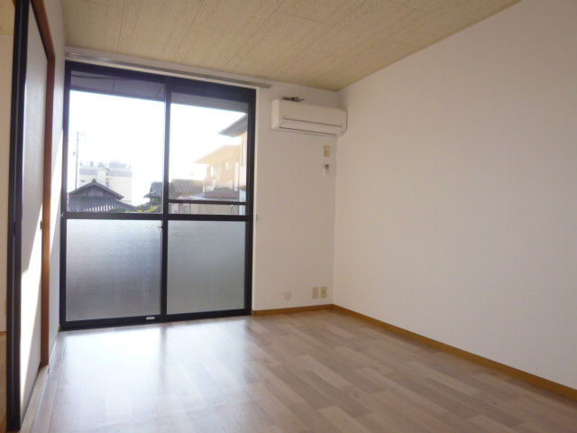 ハーモニーハイツＡの居間・リビング|洋室