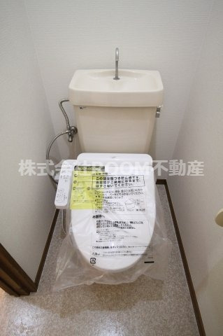 ファイン21のトイレ|落ち着いた色調のトイレです