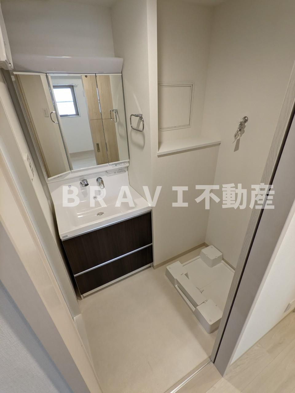 グランデカワノなにわ離宮 BRAVI不動産の洗面所|効率的なサイズの洗面上