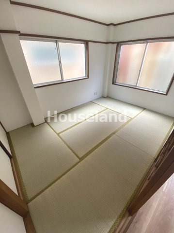 コーポ奥出の寝室|広くて明るい寝室