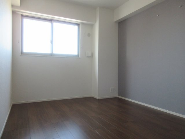 エムライズ大観町の寝室