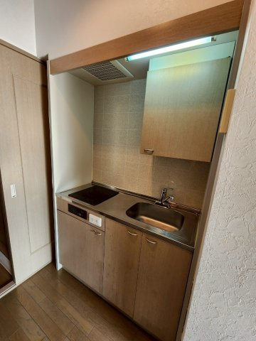 ディアコート八木のキッチン|IHクッキングヒーターのシステムキッチン