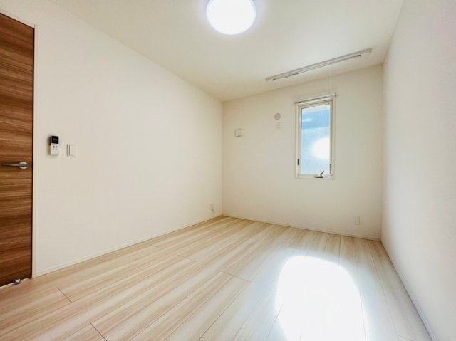 YKメゾン舞子台の寝室