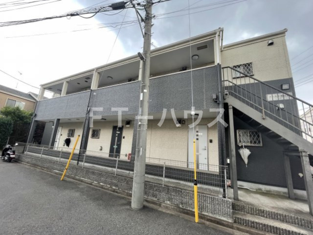 コーモド飯山満