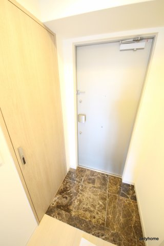 レジュールアッシュ梅田ＮＥＸ　仲介手数料無料の玄関