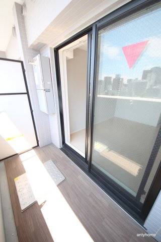 レジュールアッシュ梅田ＮＥＸ　仲介手数料無料のバルコニー